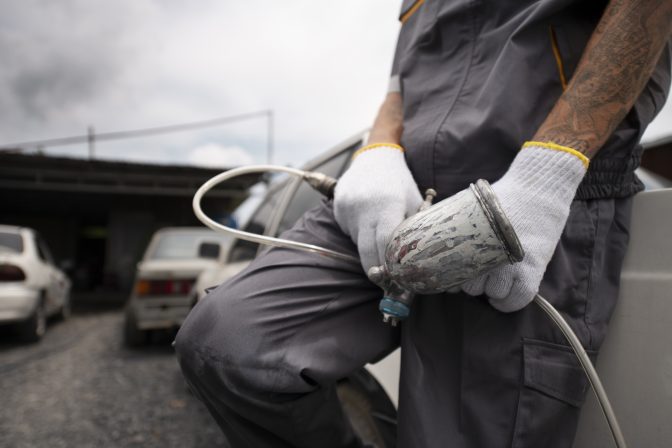man-wearing-protective-equipment-side-view
